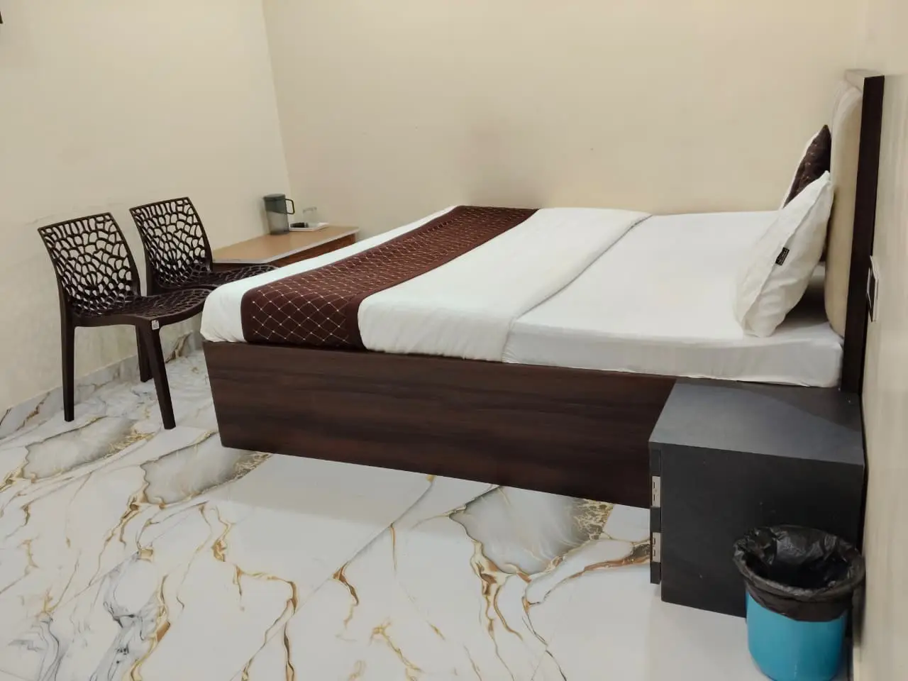 Neat and cozy standard room for varanasi accommodation for family